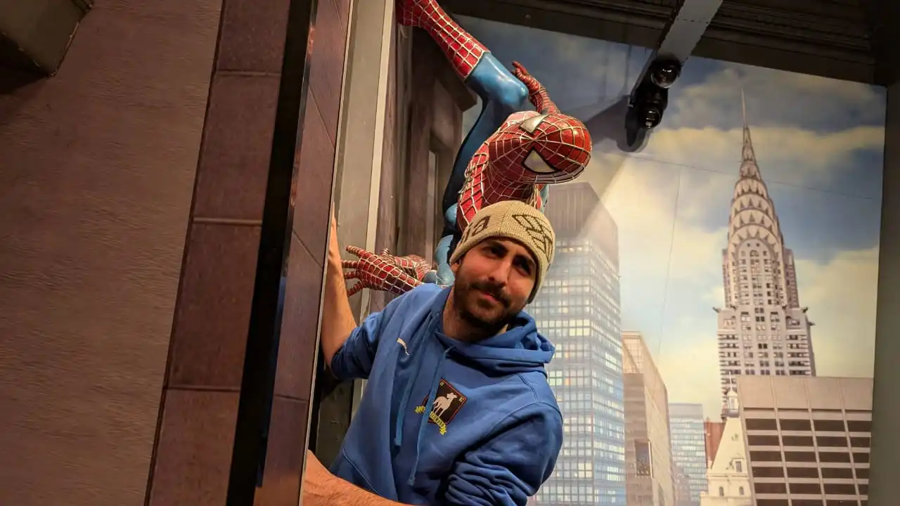 Profile picture with Spider-Man statue